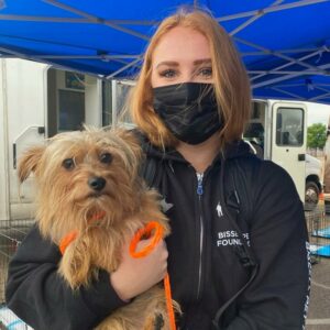 Natalie holding yorkie