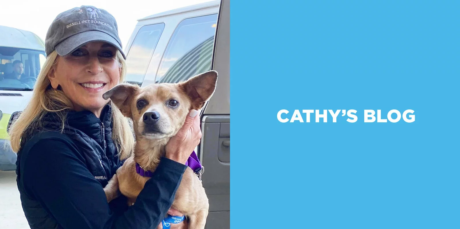Cathy holding dog