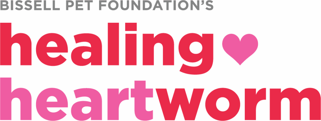 Text graphic reads: “Bissell Pet Foundation’s healing heartworm,” with “healing” and “heartworm” in large, colorful letters and a pink heart symbol in place of the word “love.”.