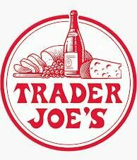 Red and white Trader Joes logo featuring a wine bottle, a loaf of bread, cheese, and grapes above the brand name in bold red letters.